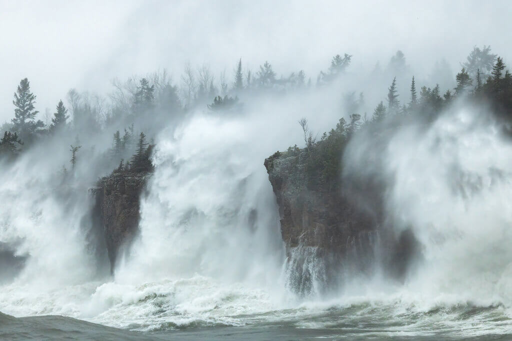 A fierce Lake Superior storm with hurricane-force gales generated waves that crashed more than 100 feet high.  Photo by John Keefover